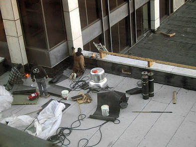 Commerciaql flat roof replacement torch-down toronto