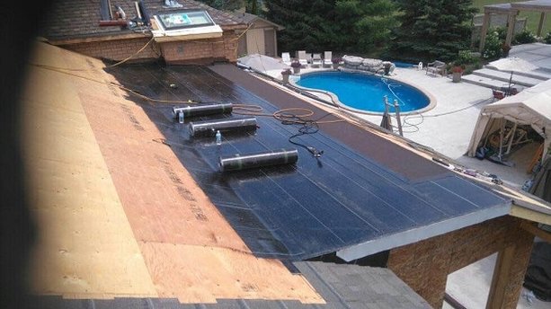 Residential flat roof meets shingles in vaughan ont